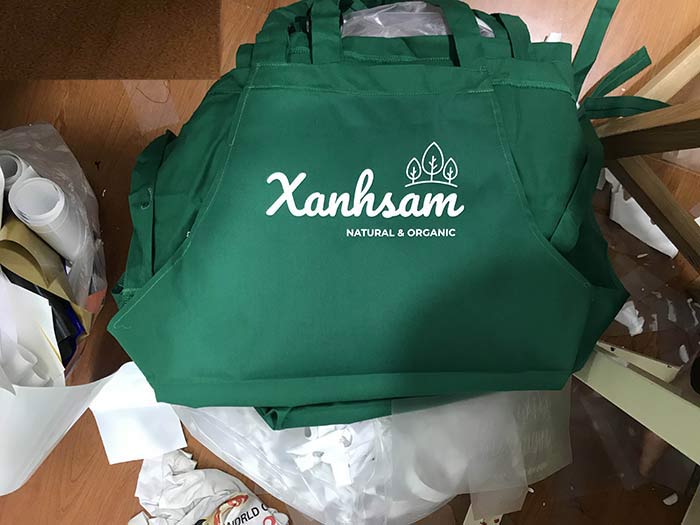 May tạp dề đồng phục Quán Xanh Sam